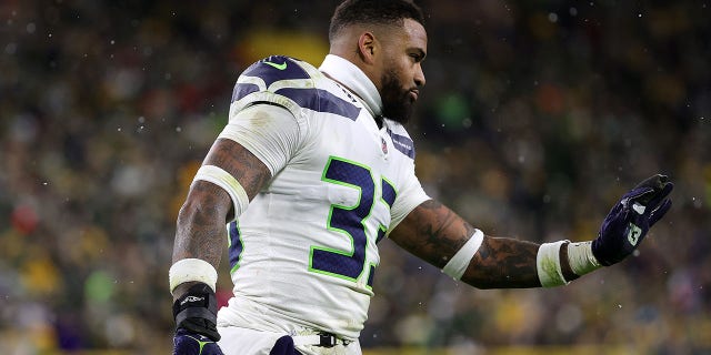 Jamal Adams, the 33rd player for the Seattle Seahawks, waits for a timeout during a game against the Green Bay Packers at Lambo Field on November 14, 2021 in Green Bay, Wisconsin. The Packers beat the Seahawks 17-0.