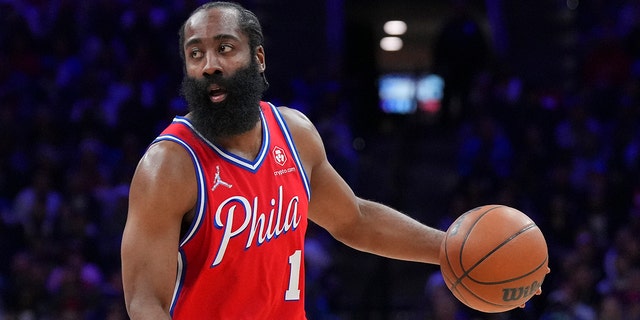 James Harden of the Philadelphia 76ers dribbles the ball against the Miami Heat during Game 4 of the 2022 NBA Eastern Conference semifinals at the Wells Fargo Center May 8, 2022, in Philadelphia.
