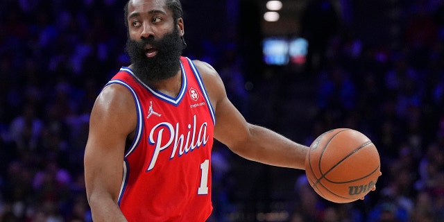 James Harden of the Philadelphia 76ers dribbles the ball against the Miami Heat during Game 4 of the 2022 NBA Eastern Conference semifinals at the Wells Fargo Center May 8, 2022, in Philadelphia.