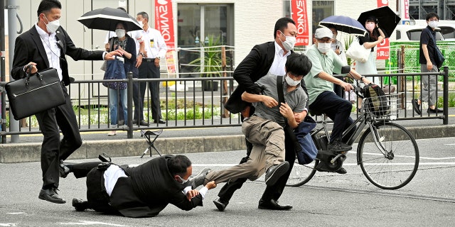 A man believed to have shot dead former Prime Minister Shinzo Abe was attacked by police officers in Nara City on July 8.