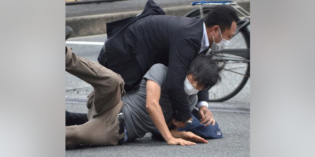 Tetsuya Yamagami confronted the authorities after the shooting. 