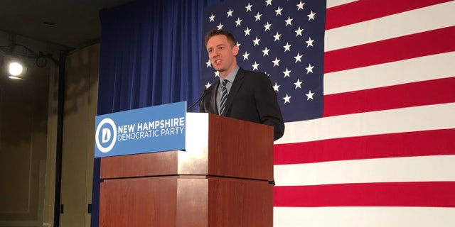 Jason Kander speaks at a New Hampshire Democratic Party fundraising dinner, on April 14, 2018 in Nashua, New Hampshire