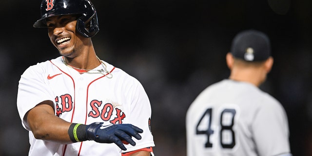 Jeter Downs of the Boston Red Sox reacts after his first career hit and RBI in the tenth inning against the New York Yankees at Fenway Park July 9, 2022, in Boston. 
