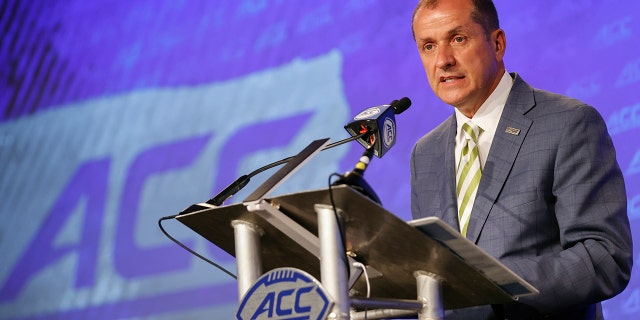 Atlantic Coast Conference commissioner Jim Phillips speaks during an NCAA college football news conference at the ACC media days in Charlotte, N.C., Wednesday, July 20, 2022.