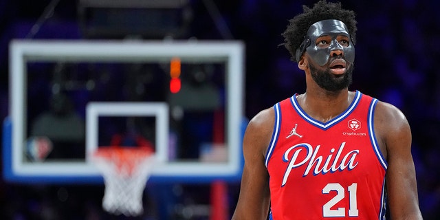 Joel Embiid #21 of the Philadelphia 76ers looks on against the Miami Heat during Game Four of the 2022 NBA Playoffs Eastern Conference Semifinals at the Wells Fargo Center on May 8, 2022 a Philadelphia, Pennsylvania. 