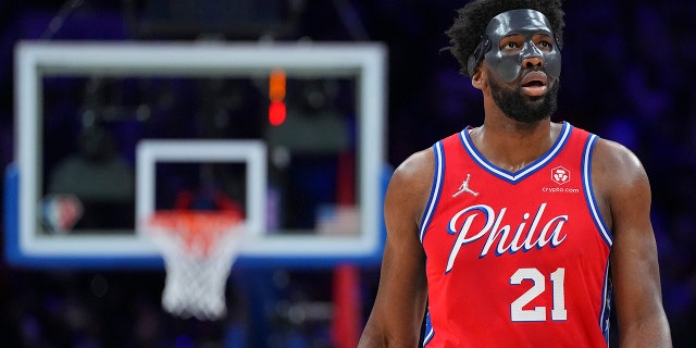 Joel Embiid #21 of the Philadelphia 76ers looks on against the Miami Heat during Game Four of the 2022 NBA Playoff Eastern Conference Semifinals at Wells Fargo Center on May 8, 2022 in Philadelphia, Pennsylvania. 