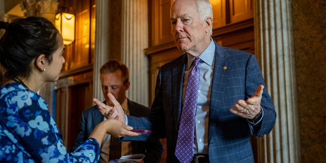 Sen. John Cornyn (R-TX) speaks to reporters ahead of a weekly Republican luncheon on Capitol Hill on June 22, 2022 in Washington, DC. 