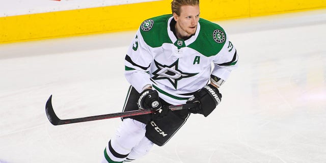 John Klingberg #3 of the Dallas Stars in action against the Calgary Flames during Game Seven of the First Round of the 2022 Stanley Cup Playoffs at Scotiabank Saddledome on May 15, 2022 in Calgary, Alberta, Canada. The Flames defeated the Stars 3-2 in overtime.