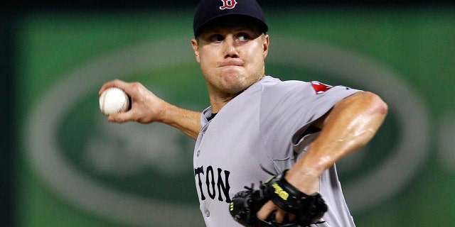 Boston Red Sox # 58 Jonathan Papelbon will face the Texas Rangers on August 24, 2011 at the Rangers Ballpark in Arlington, Arlington, Texas. The Red Sox defeated the Rangers 13-2.