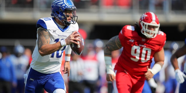 Jordan Ta'amu, #10 of the St. Louis BattleHawks, scrambles during the XFL game against the DC Defenders at Audi Field on March 8, 2020 in Washington, DC.