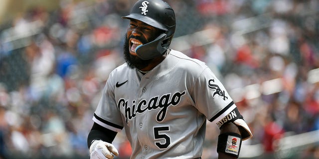 Chicago White Sox second baseman Josh Harrison shouts as he heads to the dugout after hitting a three-run home run against the Minnesota Twins during the seventh inning of a baseball game, Sunday, July 17, 2022, in Minneapolis. 
