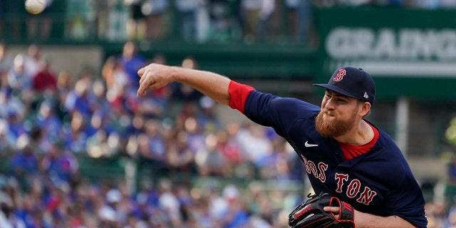 Boston Red Sox starting pitcher Josh Winckowski throws to a Chicago Cubs batter during the first inning of a baseball game in Chicago, Saturday, July 2, 2022. 