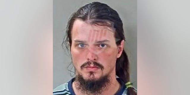 Joshua Murrey, 23, was arrested after he requested a police ride along and a routine background check revealed two sealed indictments for child rape, authorities said.