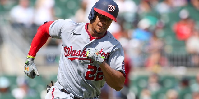 Juan Soto of the Washington Nationals runs to third against the Atlanta Braves at Truist Park July 10, 2022, in Atlanta.