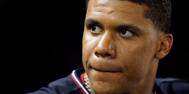 Washington Nationals' Juan Soto stands in the dugout during the seventh inning of a game against the St. Louis Cardinals, Friday, July 29, 2022, in Washington.