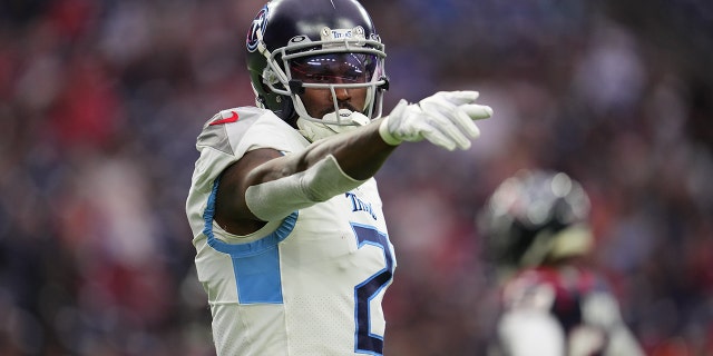 Julio Jones of the Tennessee Titans gets set against the Houston Texans during a game at NRG Stadium on Jan. 9, 2022, in Houston, Texas.