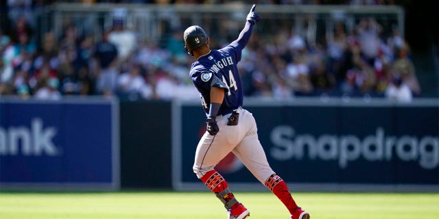 Seattle Mariners' Julio Rodriguez reacts after hitting a two-run home run during the fourth inning of a baseball game against the San Diego Padres, Monday, July 4, 2022, in San Diego.