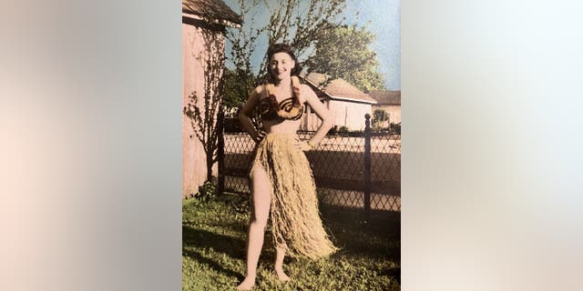 June Malicote donned the grass skirt Hubert Malicote sent her while he was stationed in Hawaii during World War II. This is the photo she sent him back.