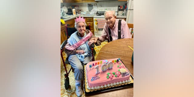 June and Hubert Malicote celebrated their 100th birthdays at home with a pink sheet cake.