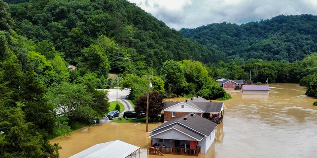Homes in Jackson, Kentucky, on July 28 were flooded with water from the North Fork of the Kentucky River.