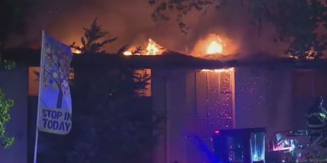 Two people died in a fire that investigators believe was intentionally set at an apartment complex in Kansas City Missouri, early Monday.