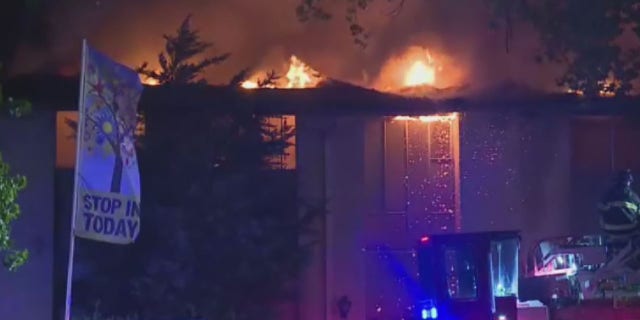 Two people died in a fire that investigators believe was intentionally set at an apartment complex in Kansas City Missouri, early Monday.