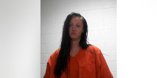 Katherine Penner is facing charges facing one count of desecration of a human corpse and other charges in connection with the death of a toddler. {Image via Oklahoma State Bureau of Investigation)
