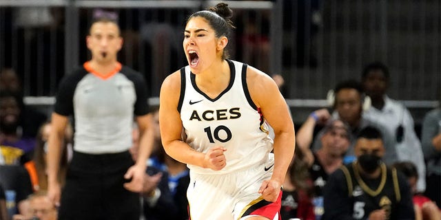 Las Vegas Aces' Kelsey Plum yells out after scoring during the second half of the WNBA Commissioner's Cup basketball game against the Chicago Sky Tuesday, July 26, 2022, in Chicago. The Aces won 93-83. 