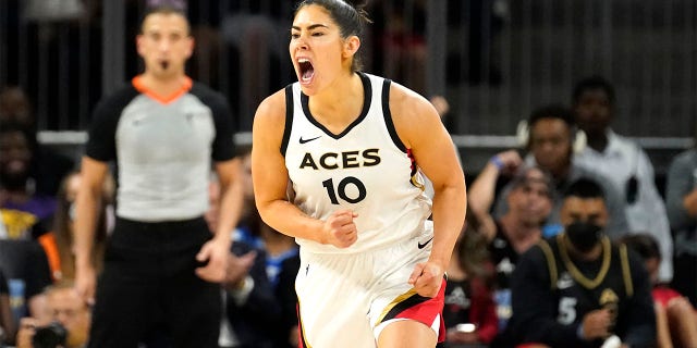 Las Vegas Aces' Kelsey Plum yells out after scoring during the second half of the WNBA Commissioner's Cup basketball game against the Chicago Sky Tuesday, July 26, 2022, in Chicago. The Aces won 93-83.