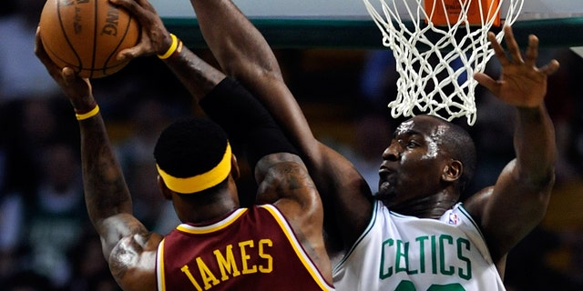 Kendrick Perkins of the Boston Celtics Center will defend the Cleveland Cavaliers' Forward LeBron James in the first quarter of the third match of the Eastern Conference Semifinals at TD Garden on Friday, May 7, 2010.