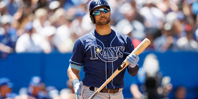 Kevin Kiermaier #39 of the Tampa Bay Rays heads to the dugout after his at bat during their MLB game against the Toronto Blue Jays at Rogers Centre on July 3, 2022 in Toronto, Canada. 