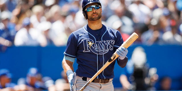 Kevin Kiermaier #39 of the Tampa Bay Rays heads to the dugout after his at bat during their MLB game against the Toronto Blue Jays at Rogers Centre on July 3, 2022 in Toronto, Canada.