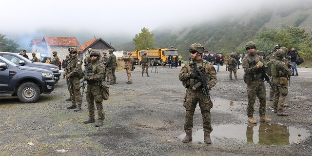 FILE - A view from the road to the Jarinje and Bernjak border crossings, after Kosovo Serbs removed the barricades they had set up, in Jarinje, Kosovo, on Oct. 2, 2021.