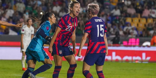 United States' Kristie Mewis (22) celebrates scoring her side's opening goal against Mexico during a CONCACAF Women's Championship soccer match in Monterrey, Mexico, Monday, July 11, 2022. 