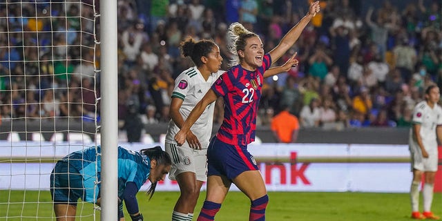 United States' Kristie Mewis (22) celebrates scoring her side's opening goal against Mexico during a CONCACAF Women's Championship soccer match in Monterrey, Mexico, Monday, July 11, 2022. 