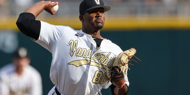 FILE - Vanderbilt pitcher Kumar Rocker, #80, throws during the first inning in Game 3 of the NCAA College World Series baseball finals on June 30, 2021, in Omaha, Neb.