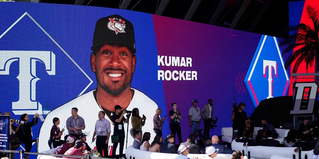 Kumar Rocker is annonunced as the third pick of the 2022 MLB baseball draft, by the Texas Rangers, Sunday, July 17, 2022, in Los Angeles.