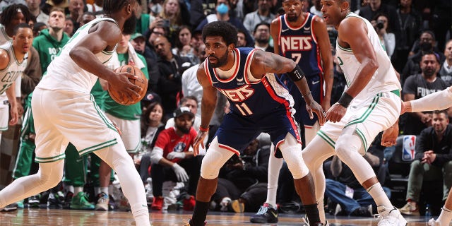 Kyrie Irving #11 of the Brooklyn Nets plays defense during Round 1 Game 4 of the 2022 NBA Playoffs on April 25, 2022 at Barclays Center in Brooklyn, New York.