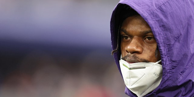 Lamar Jackson #8 of the Baltimore Ravens looks on from the sidelines in the third quarter of the game against the Los Angeles Rams at M&amp;T Bank Stadium on Jan. 2, 2022 in Baltimore, Maryland.