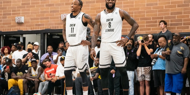 DeMar DeRozan and LeBron James smiled on the court during the Drew League pro-Am in Los Angeles on July 16, 2022.