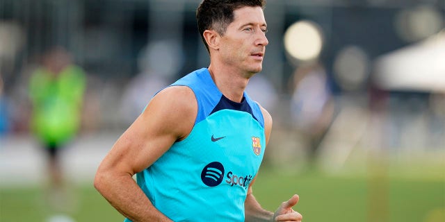 FC Barcelona's Robert Lewandowski warms up Tuesday, July 19, 2022, for the team's friendly soccer match against Inter Miami in Fort Lauderdale, Fla.