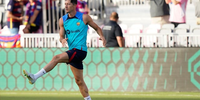 FC Barcelona's Robert Lewandowski warms up Tuesday, July 19, 2022, before the team's friendly soccer match against Inter Miami in Fort Lauderdale, Fla.Â