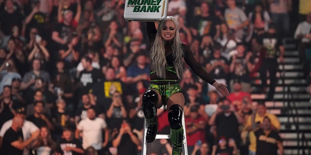 Jul 2, 2022; Las Vegas, NV, USA; Liv Morgan celebrates during the women’s Money In The Bank Match during Money In The Bank at MGM Grand Garden Arena.