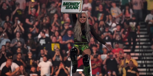 Jul 2, 2022; Las Vegas, NV, USA; Liv Morgan celebrates during the women’s Money In The Bank Match during Money In The Bank at MGM Grand Garden Arena.