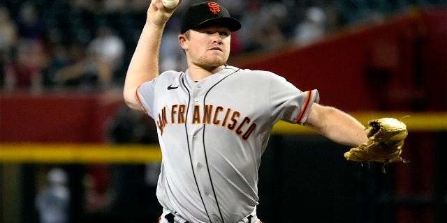 San Francisco Giants pitcher Logan Webb (62) throws in the first inning during a baseball game against the Arizona Diamondbacks, Wednesday, July 27, 2022, in Phoenix.