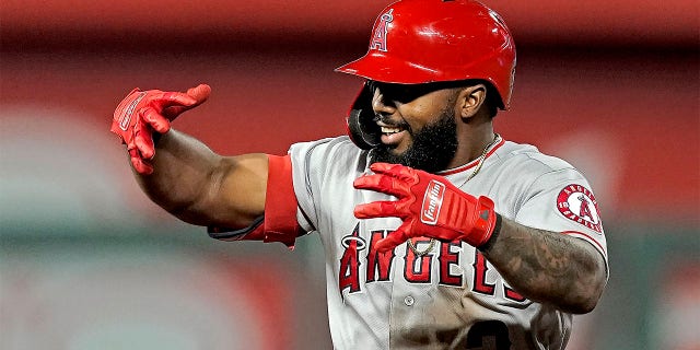 Los Angeles Angels' Luis Rengifo celebrates on second aftar hitting a two-run double during the seventh inning of a baseball game against the Kansas City Royals Tuesday, July 26, 2022, in Kansas City, Mo. 