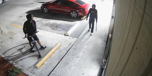 The two men were seen arguing before the shooting, and the suspect menaced the victim with a machete.