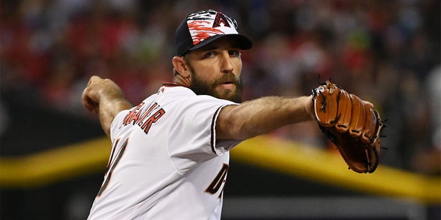 Madison Bumgarner #40 of the Arizona Diamondbacks pitches in the first inning against the San Francisco Giants at Chase Field on July 04, 2022 in Phoenix, Arizona. 