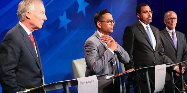 From left, Maryland Comptroller Peter Franchot, Ashwani Jain, John King and Tom Perez before a Democratic gubernatorial primary debate on June 6, 2022, in Owings Mills, Maryland.