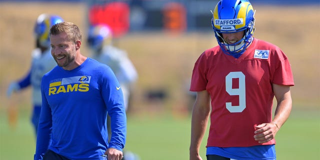 Head coach Sean McVay talks with Matthew Stafford #9 of the Los Angeles Rams during mini camp on June 8, 2022 at the team's facility at California Lutheran University in Thousand Oaks, California.